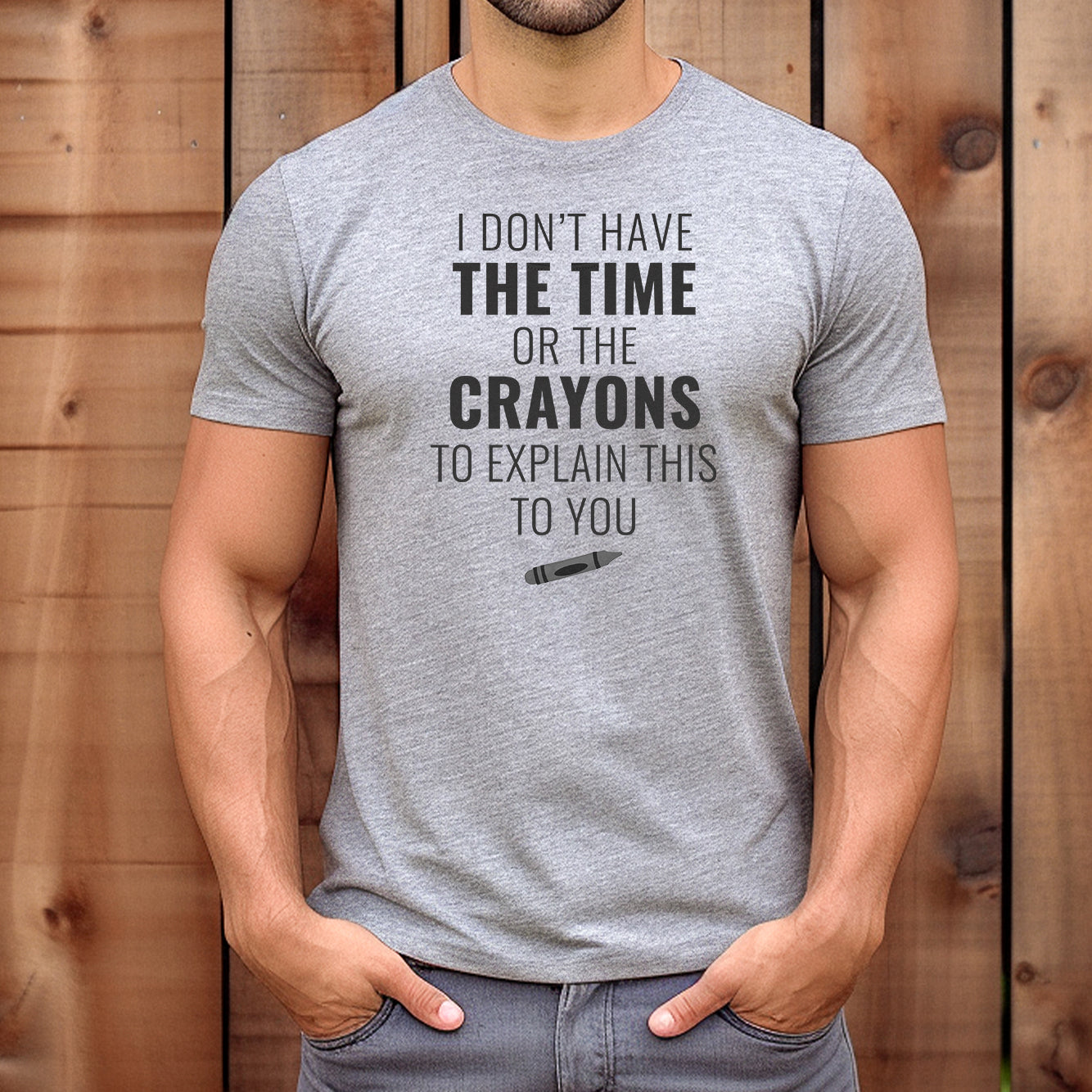 Man wearing grey graphic t-shirt with sarcastic quote I don’t have the time or the crayons to explain this to you