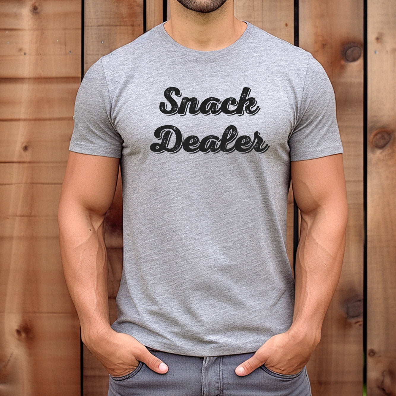 Man wearing Snack Dealer grey t-shirt, casual funny graphic tee for men