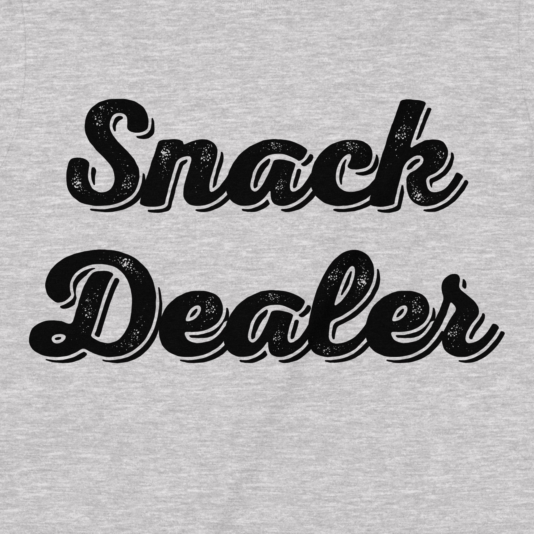 Close-up of Snack Dealer text design on heather grey t-shirt, retro black font style