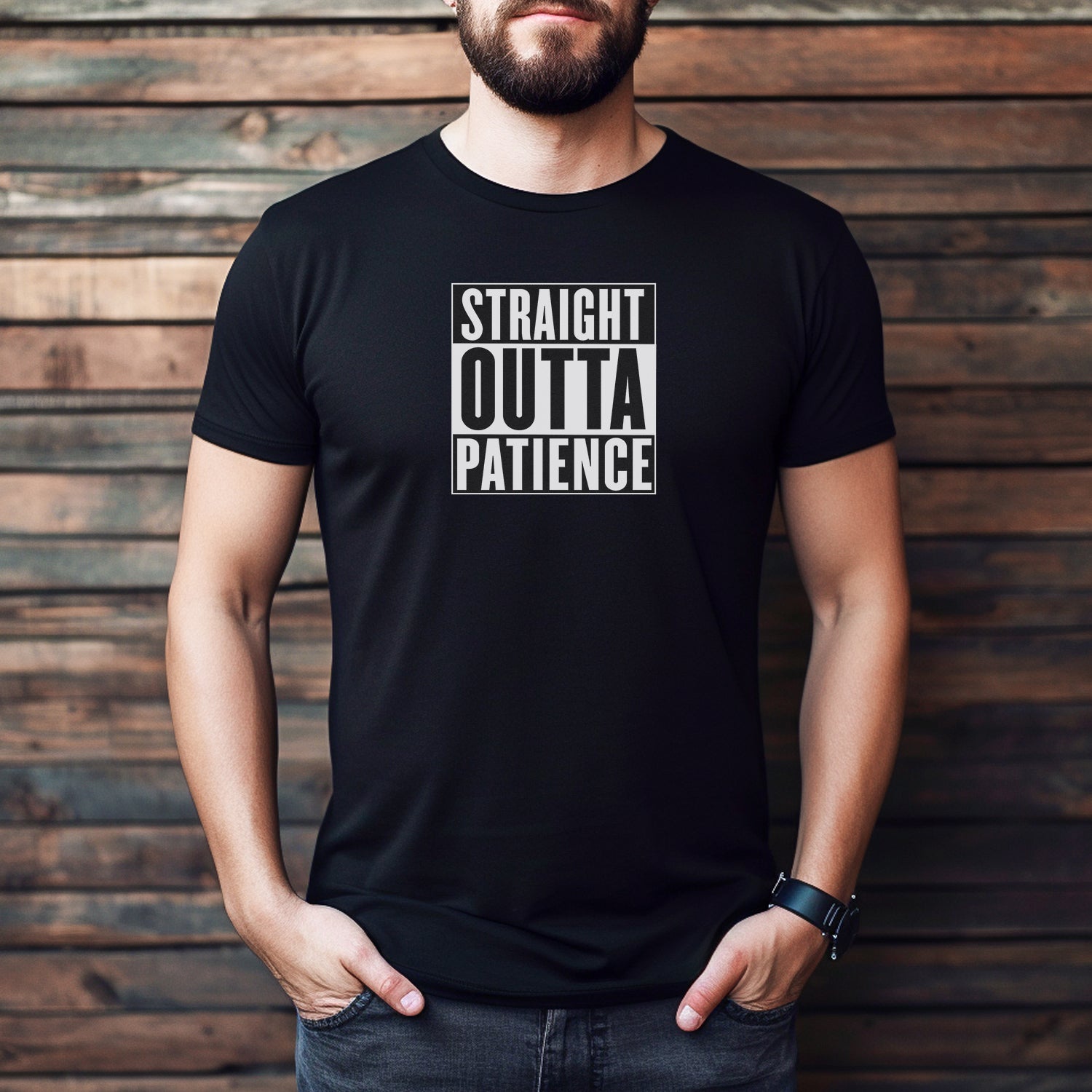 Man wearing black graphic tee with white block lettering that says Straight Outta Patience