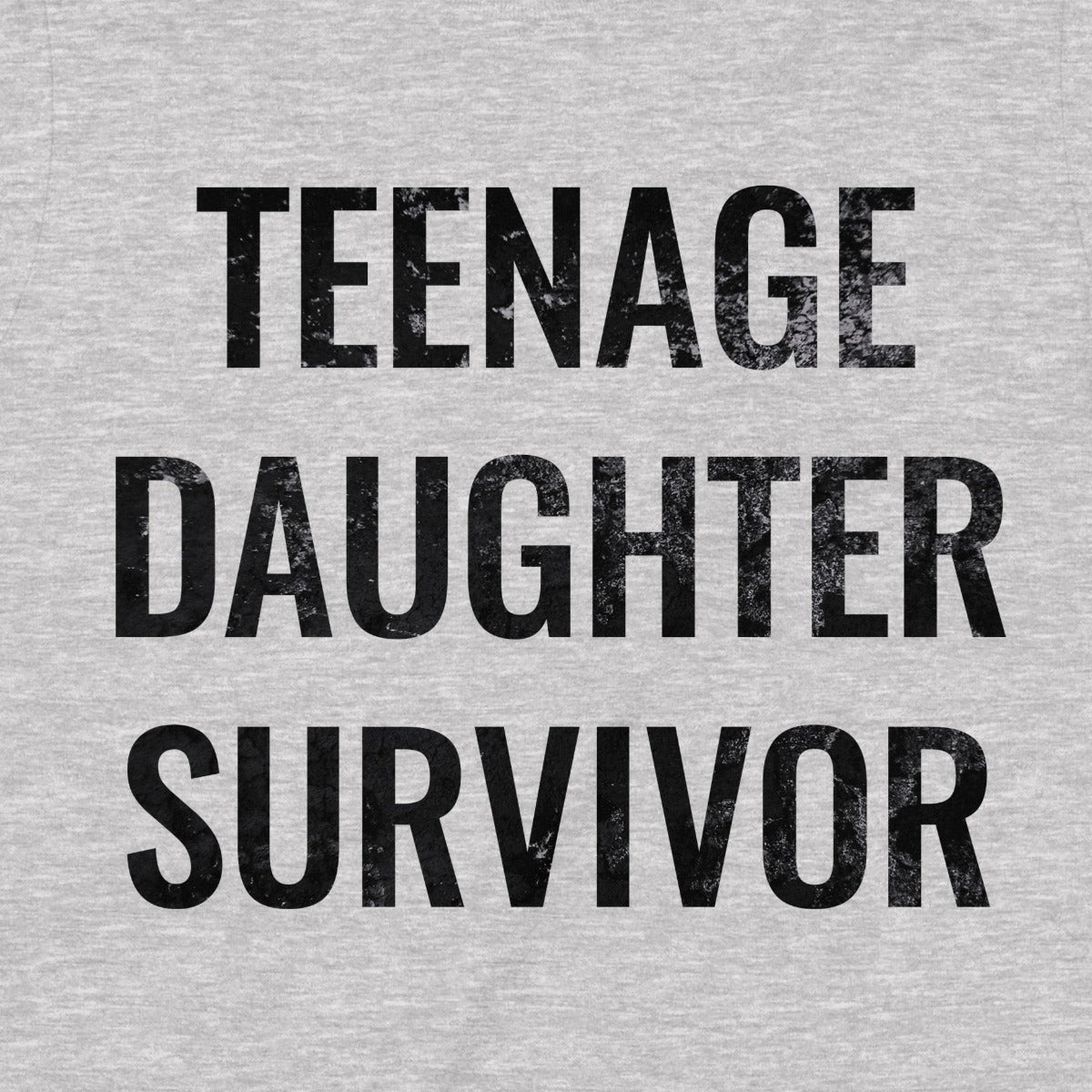 Close-up of grey t-shirt fabric with bold distressed black text Teenage Daughter Survivor