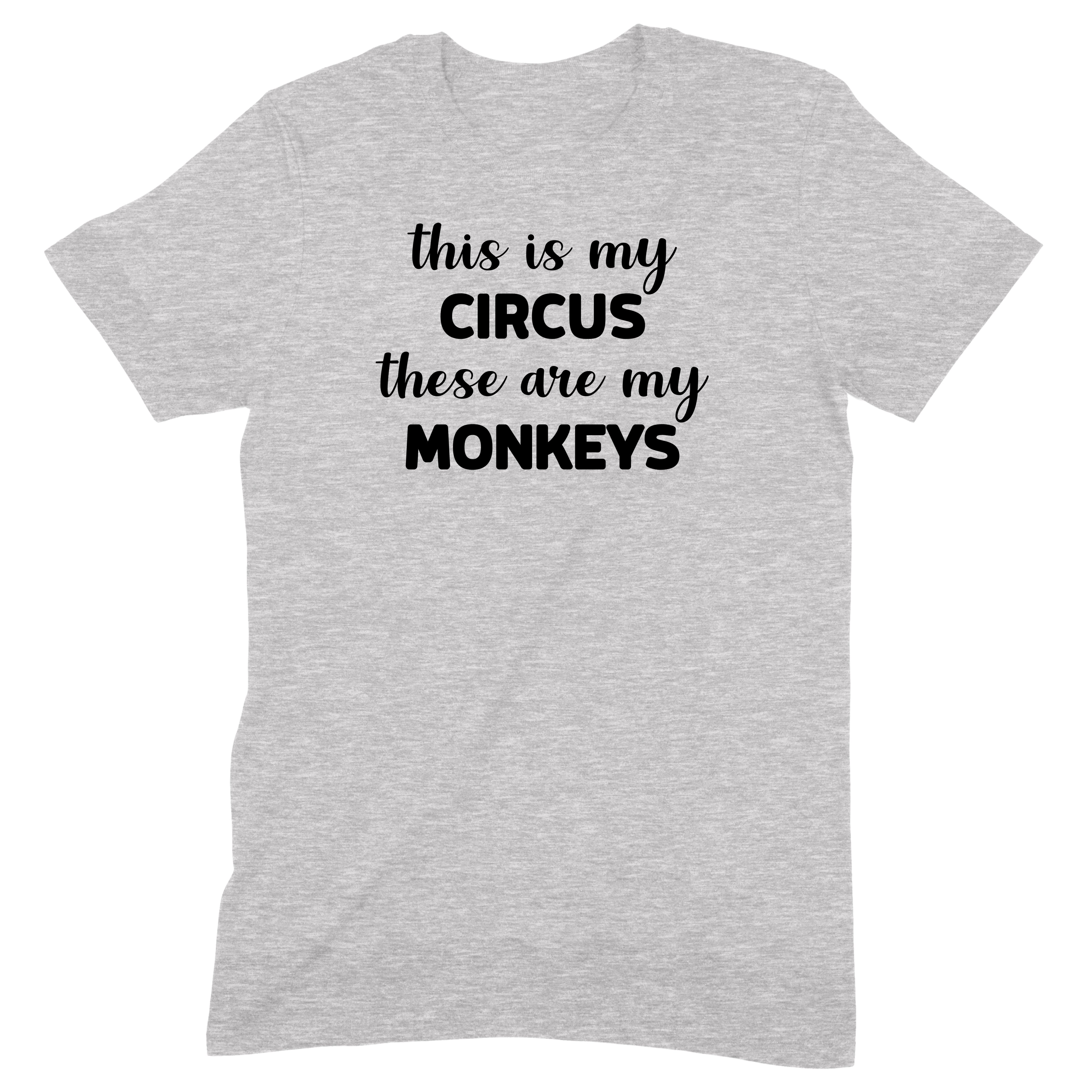 Flat lay of grey t-shirt with the phrase This Is My Circus These Are My Monkeys in bold black text