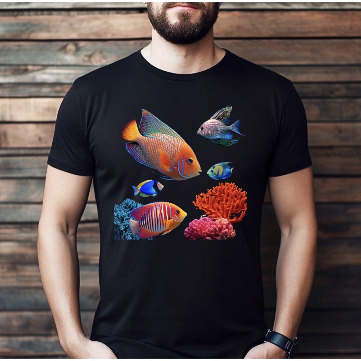 Man wearing black t-shirt with colorful tropical reef fish and coral graphic, casual lifestyle