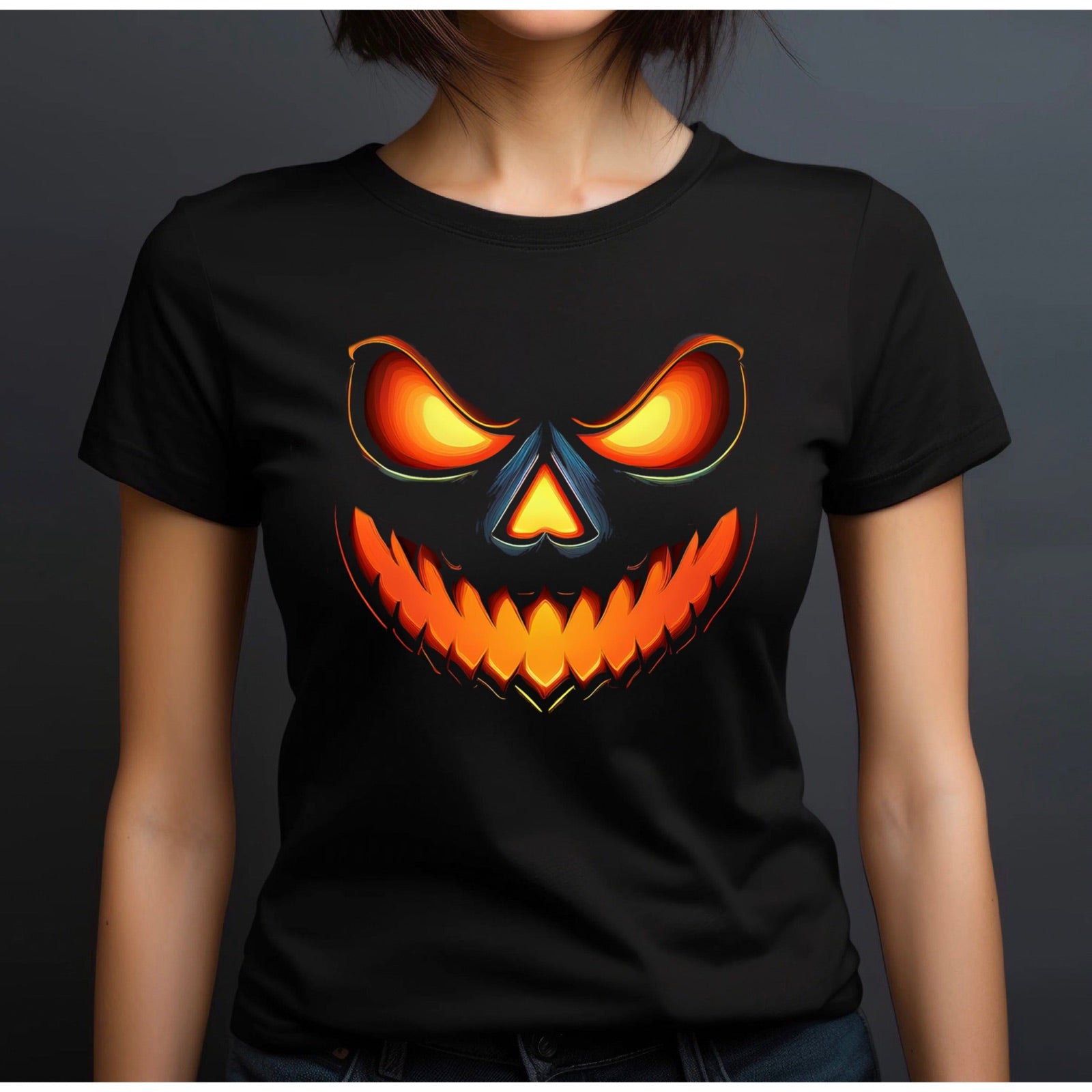 Women’s black crewneck Halloween t-shirt with glowing jack-o-lantern face on dark background