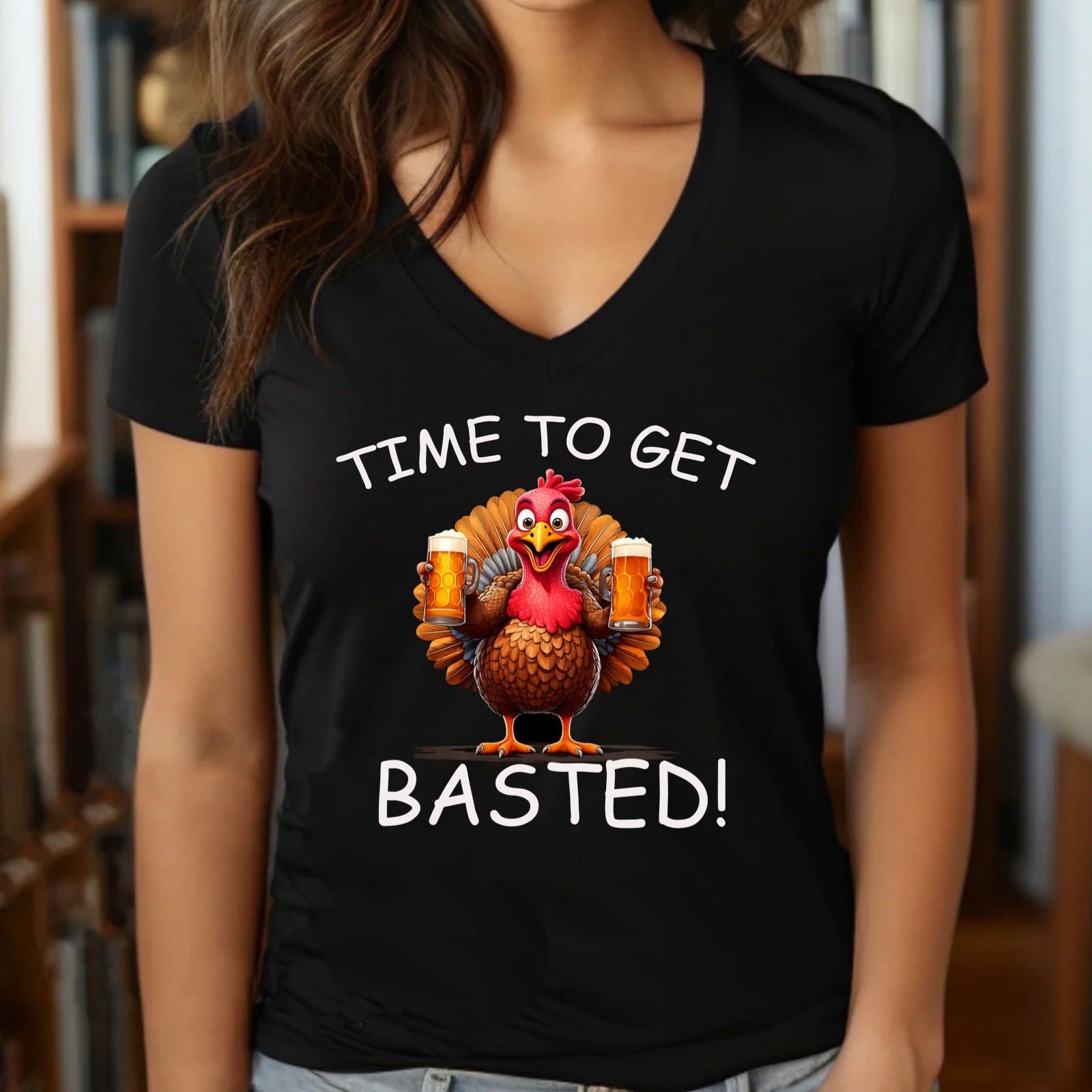 Woman in v-neck black t-shirt with funny Thanksgiving turkey and Time to Get Basted design