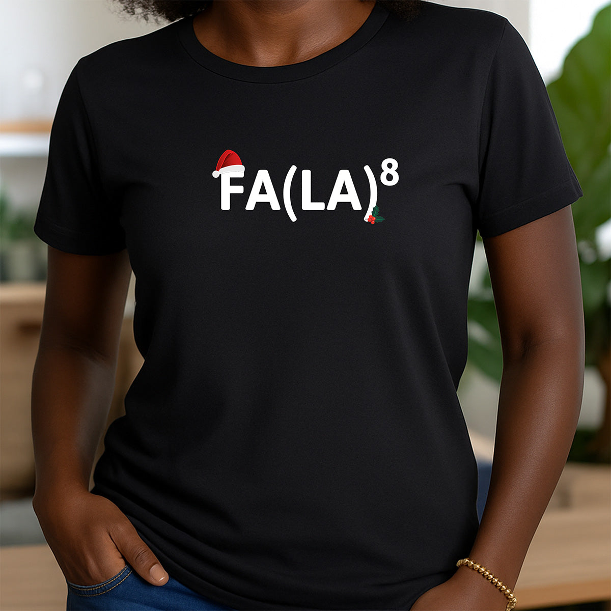 Woman wearing black crewneck Christmas shirt with FA(LA)⁸ design and Santa hat
