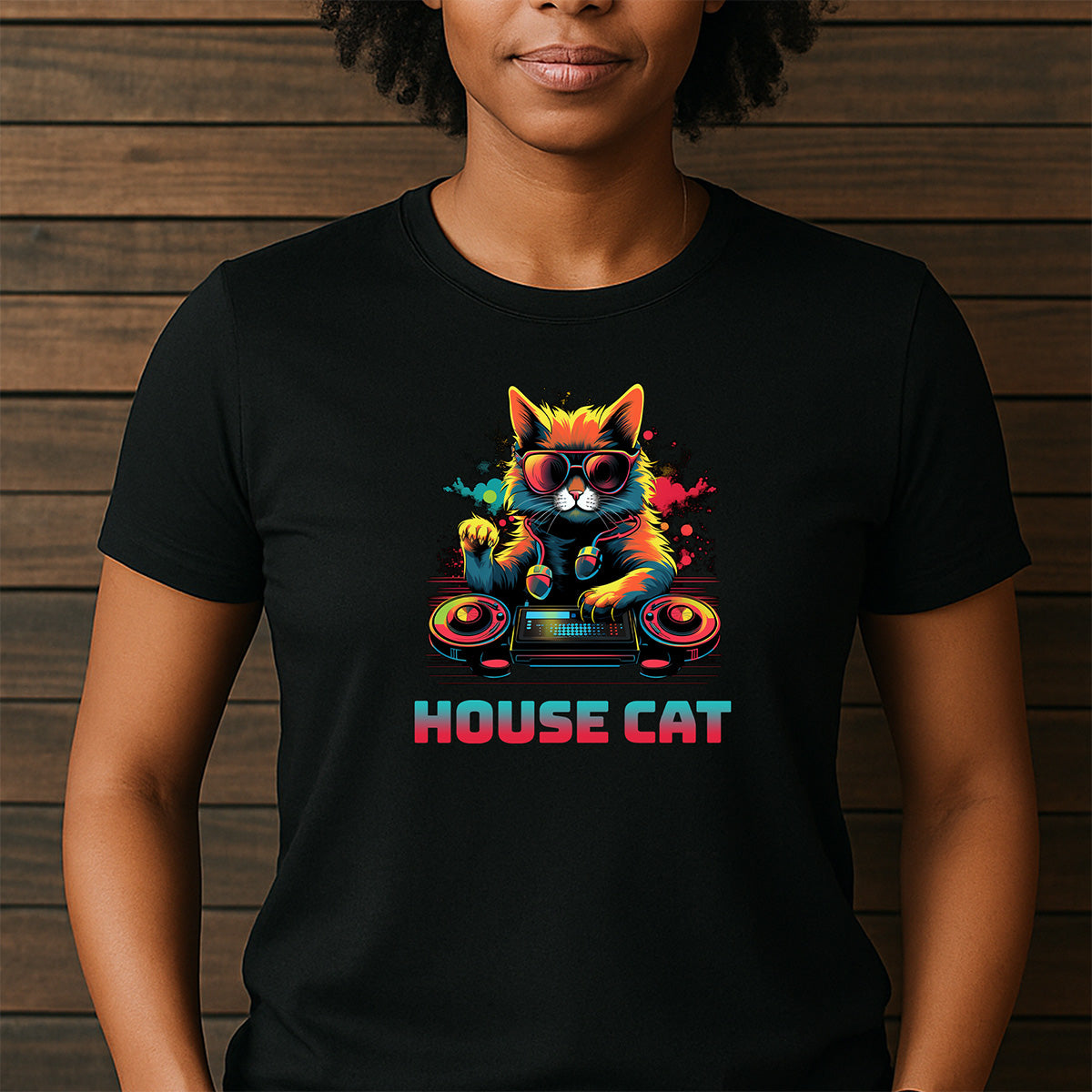 Woman in crew neck black tee with neon House Cat DJ design and turntables graphic