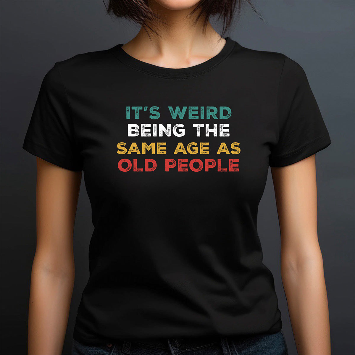 Women’s crewneck black t-shirt with phrase It’s Weird Being The Same Age As Old People in retro colors; humorous birthday gift
