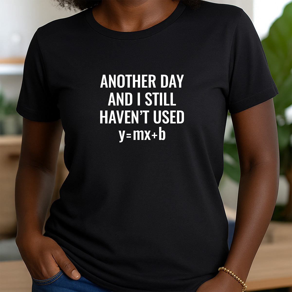 Woman wearing black crewneck shirt with funny math text Another Day and I Still Haven’t Used y=mx+b