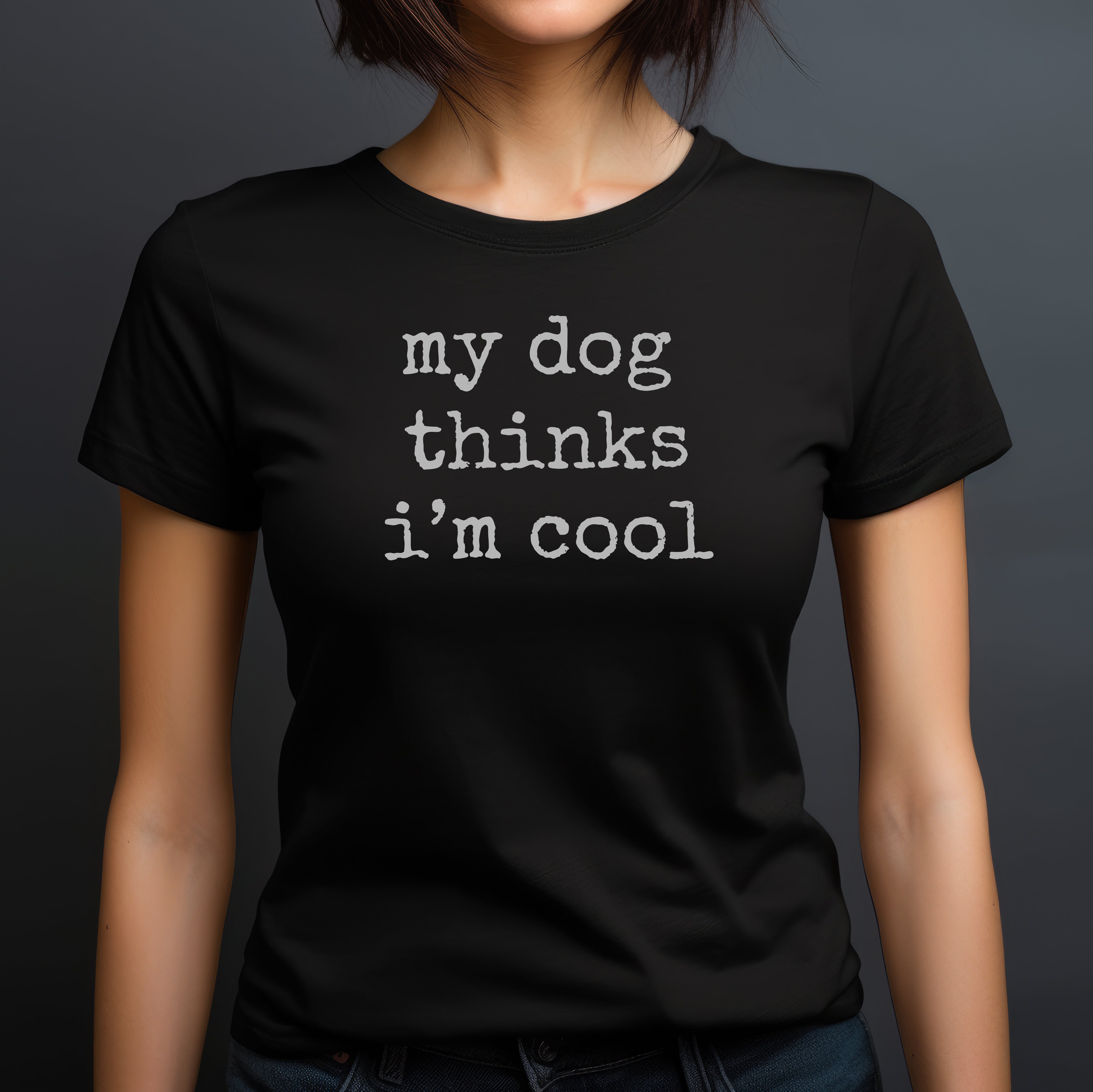 Woman in fitted black graphic tee with dog-inspired quote “my dog thinks I’m cool.”