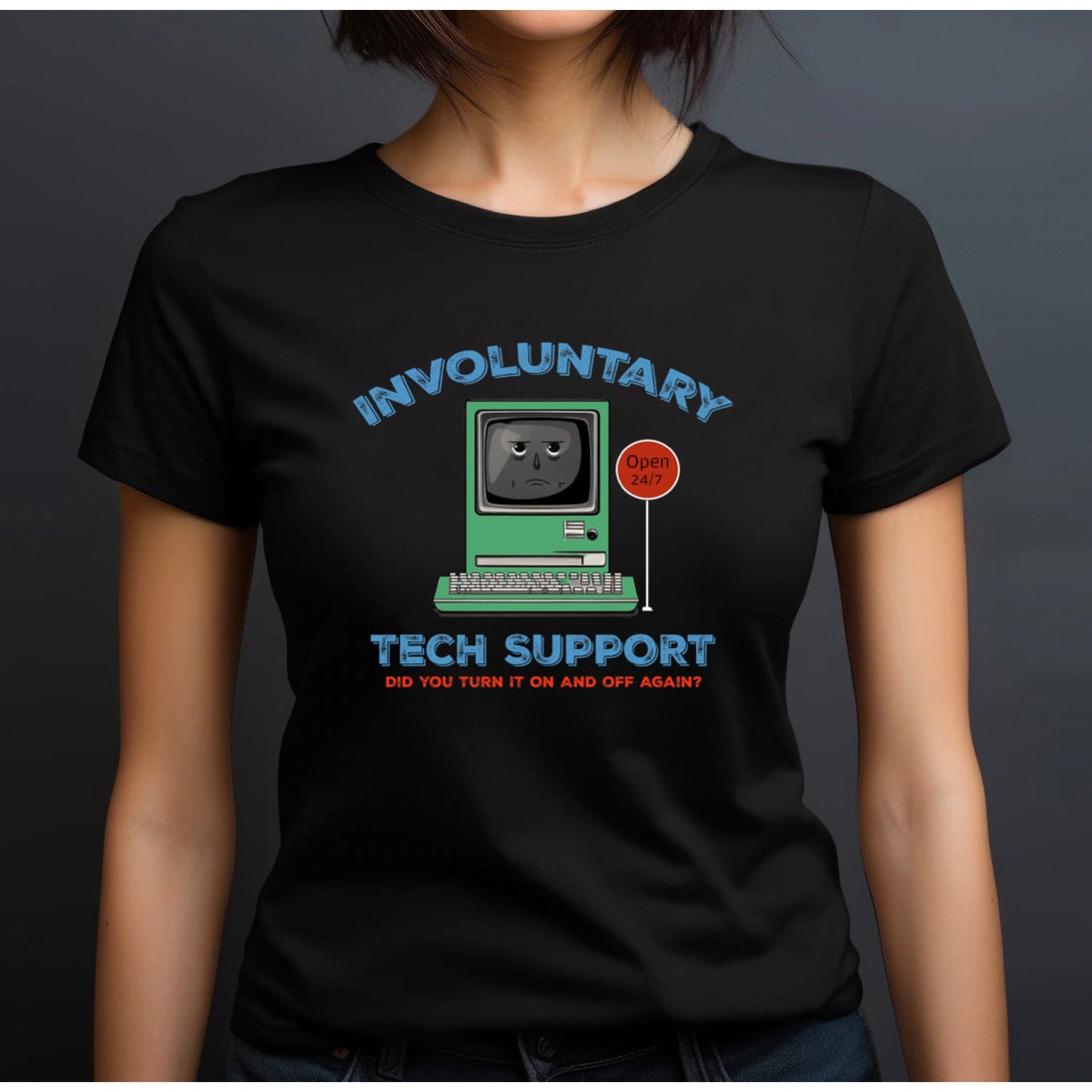 Woman in crew neck black t-shirt featuring retro computer with text involuntary tech support joke