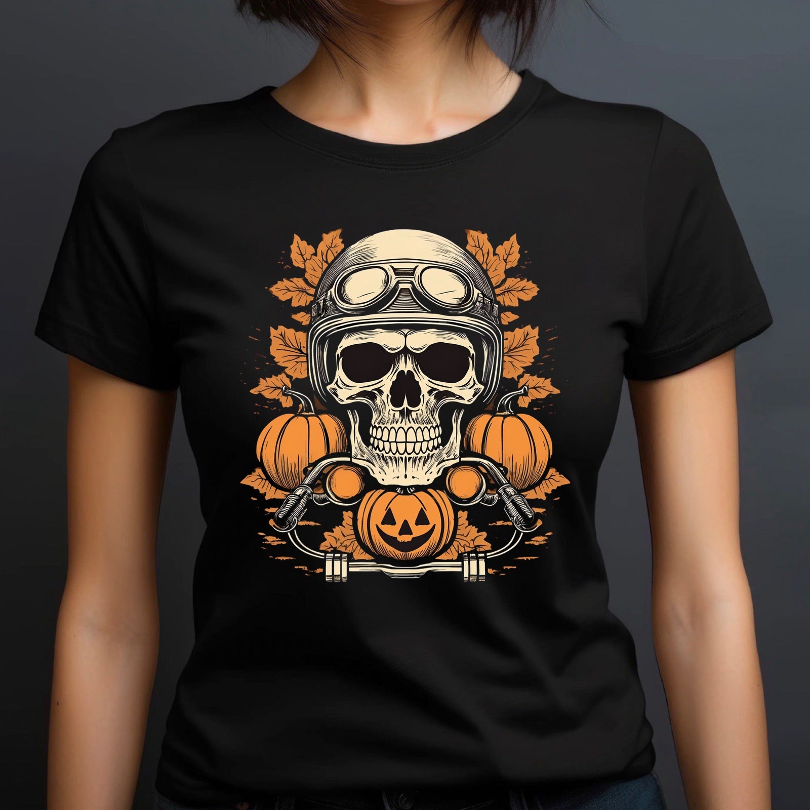 Women’s fitted Halloween t-shirt featuring a skull in a biker helmet surrounded by pumpkins and leaves, spooky fall fashion.
