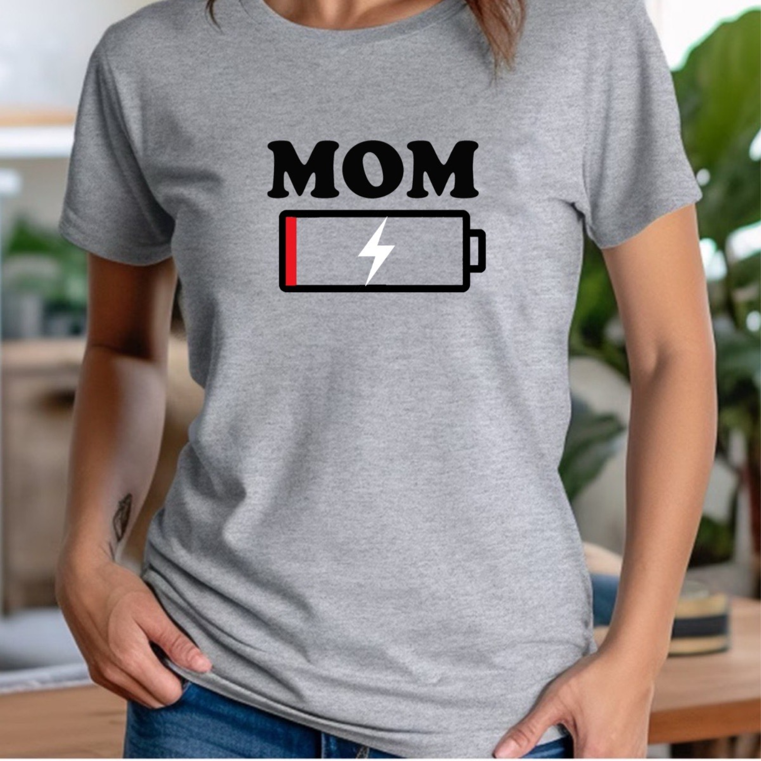 Woman in gray MOM low battery crewneck t-shirt, casual funny shirt for moms