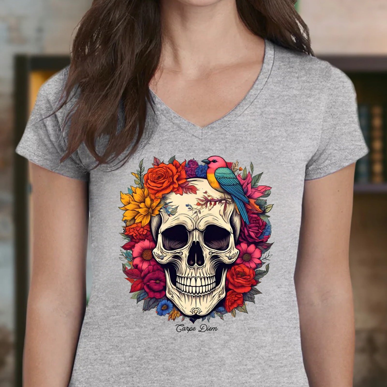 Women’s heather gray v-neck t-shirt featuring skull with floral wreath and bird, Carpe Diem design
