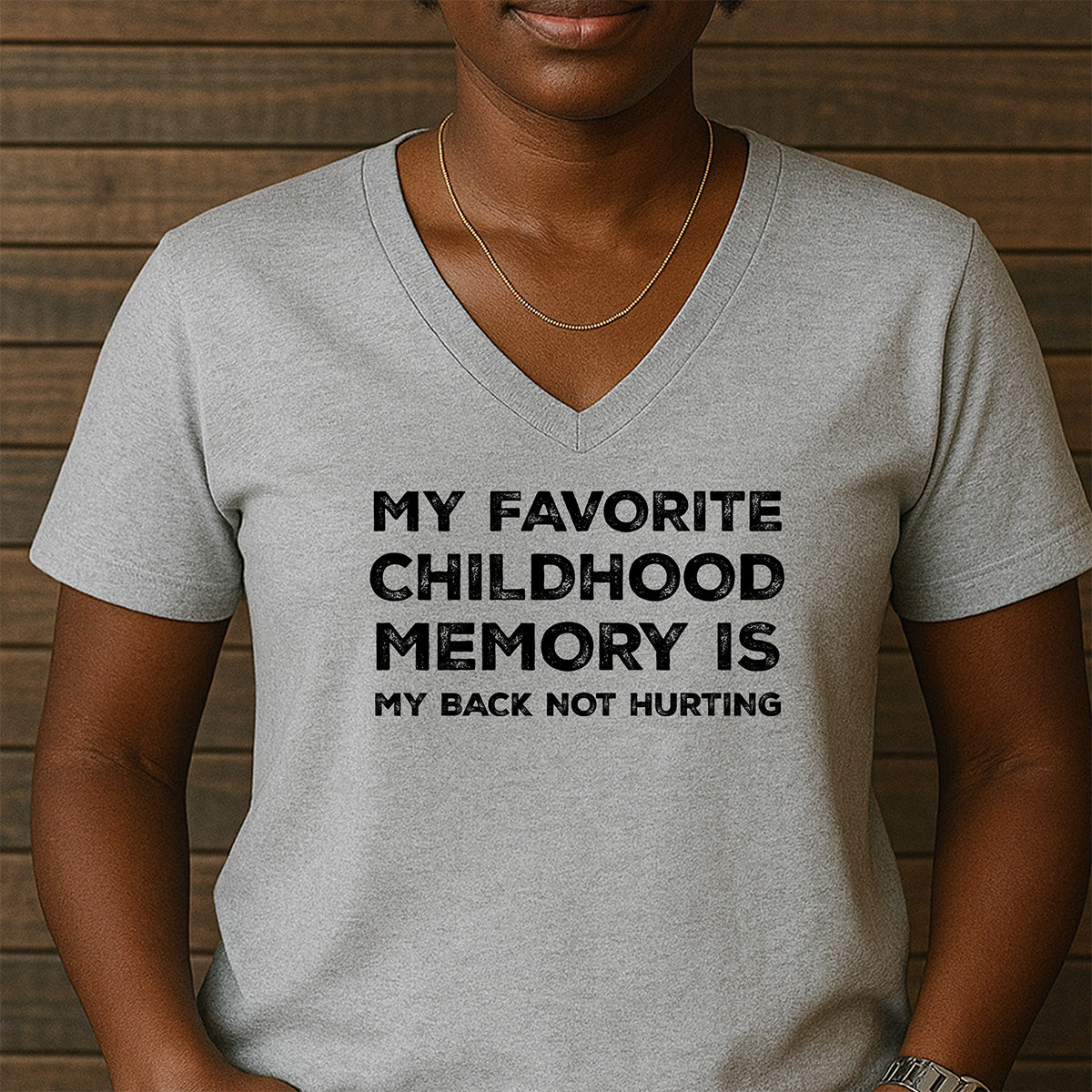 Grey women’s v-neck t-shirt with text My Favorite Childhood Memory Is My Back Not Hurting funny aging humor tee