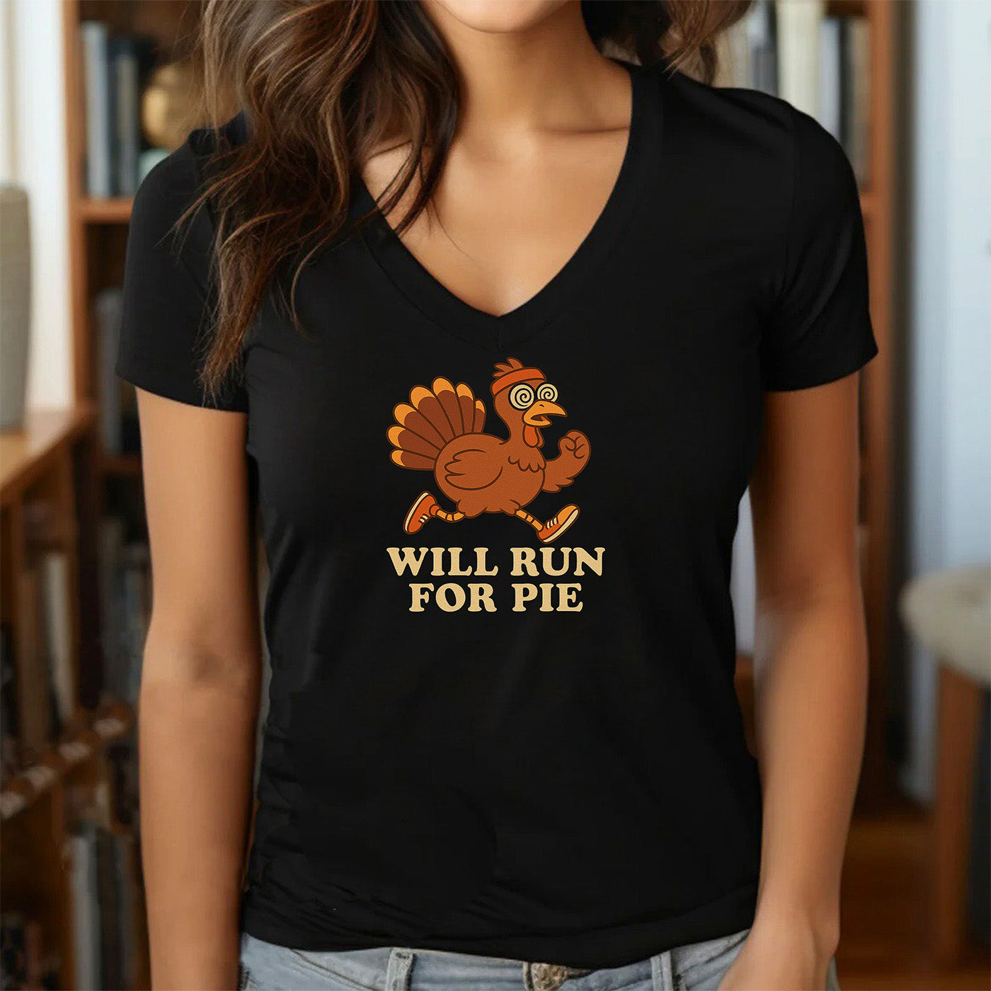 woman wearing black v-neck t-shirt with running turkey and phrase will run for pie humorous design