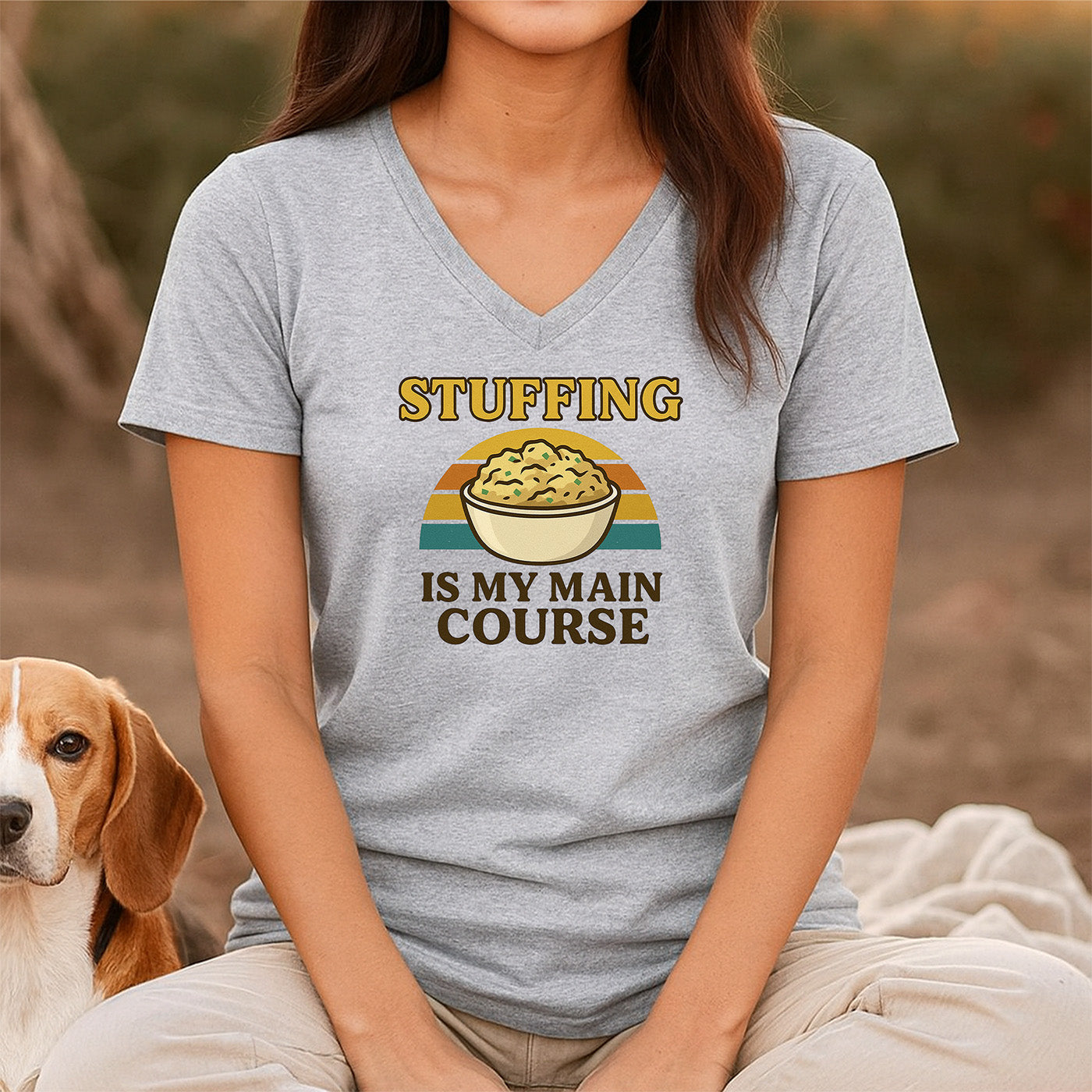 woman wearing gray v-neck t-shirt featuring bowl of stuffing with phrase stuffing is my main course funny holiday tee