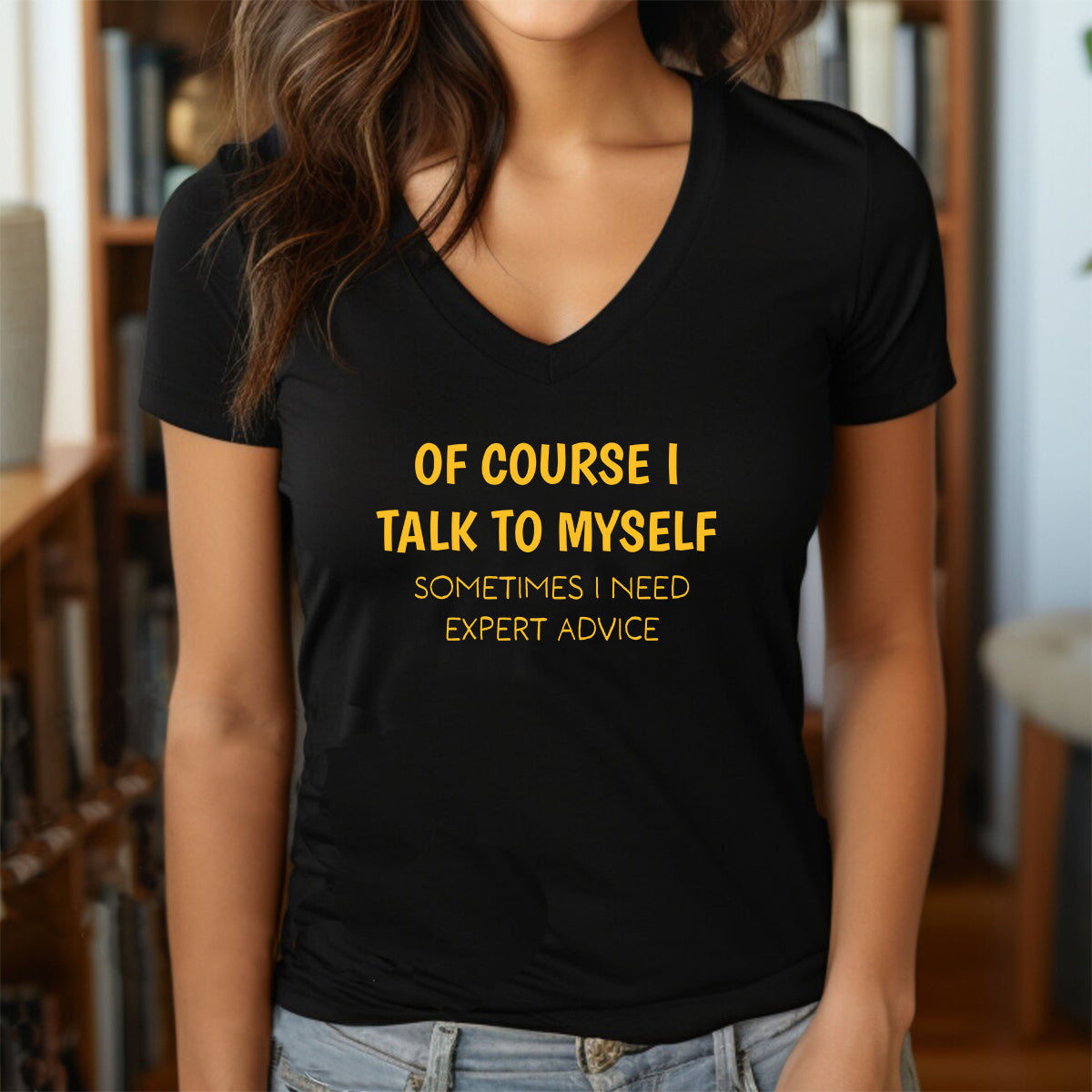 woman wearing v-neck black t-shirt with humorous yellow text expert advice design