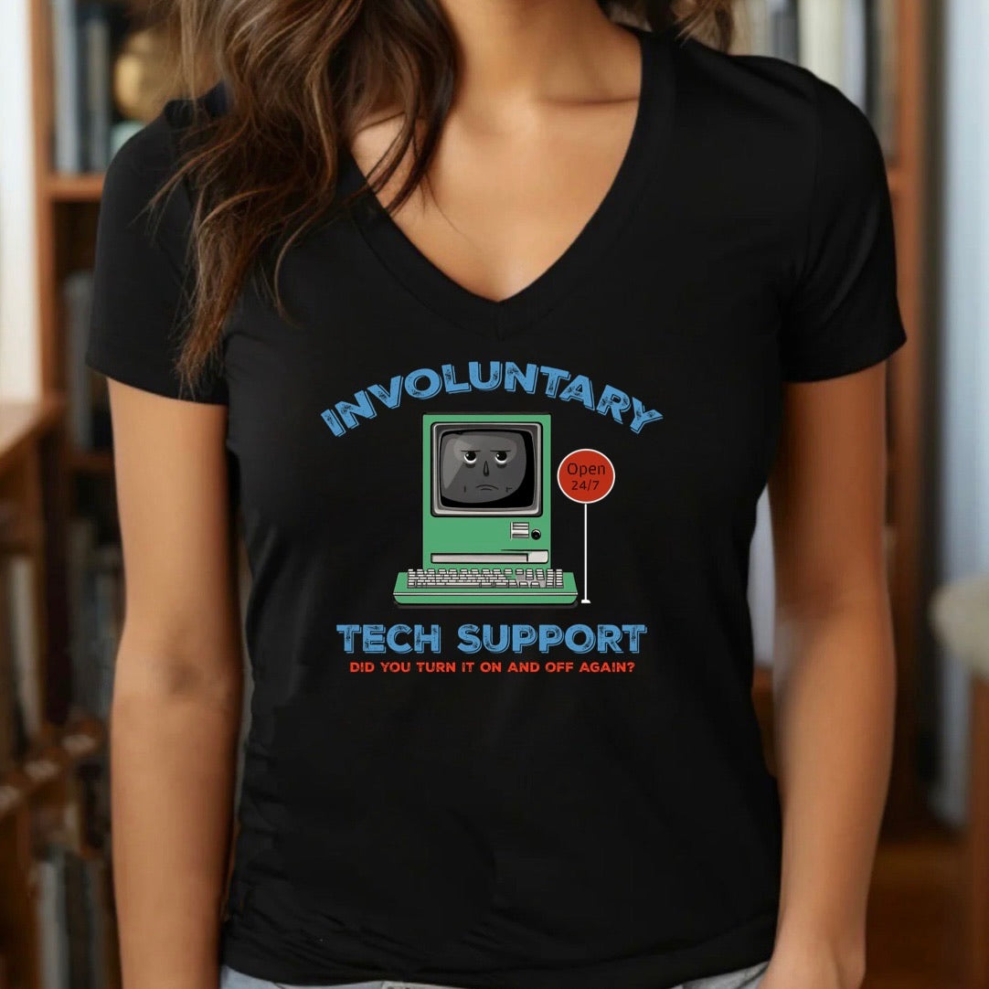Woman in black v-neck t-shirt with retro computer and involuntary tech support 24 7 funny print