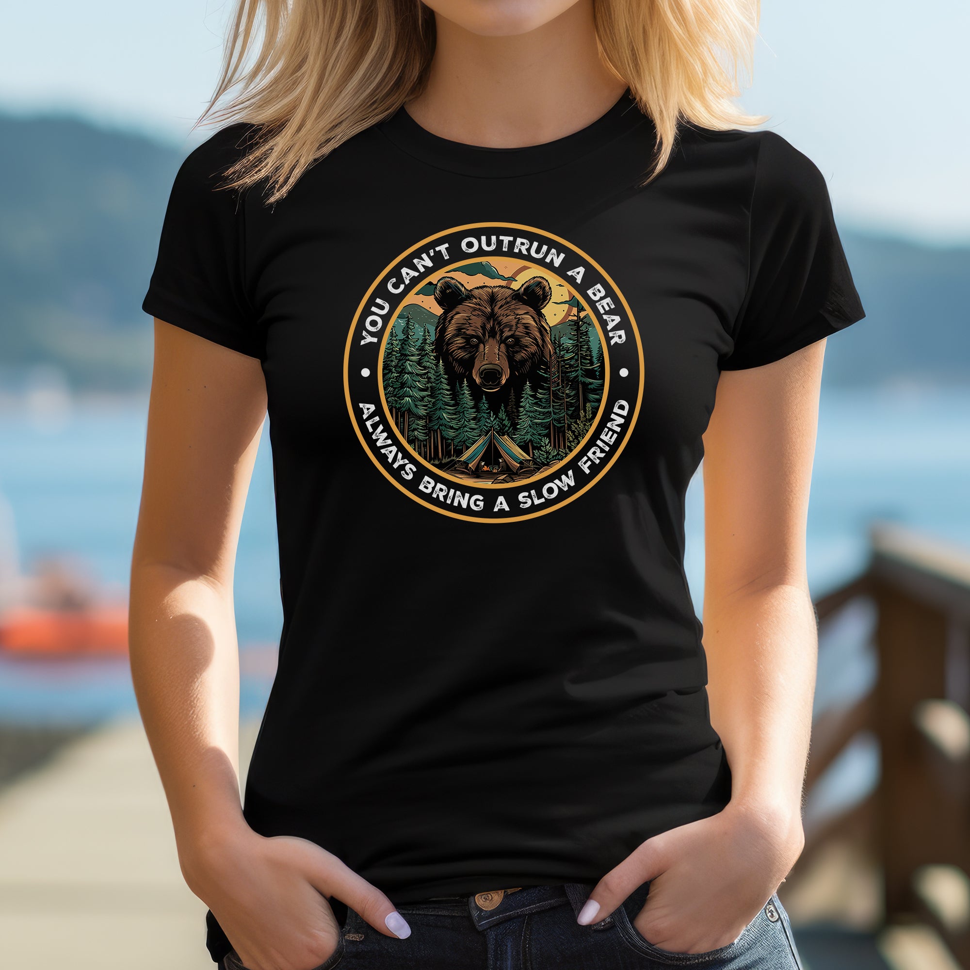 Woman outdoors in black fitted t-shirt with bear camping graphic and funny quote about hiking and camping