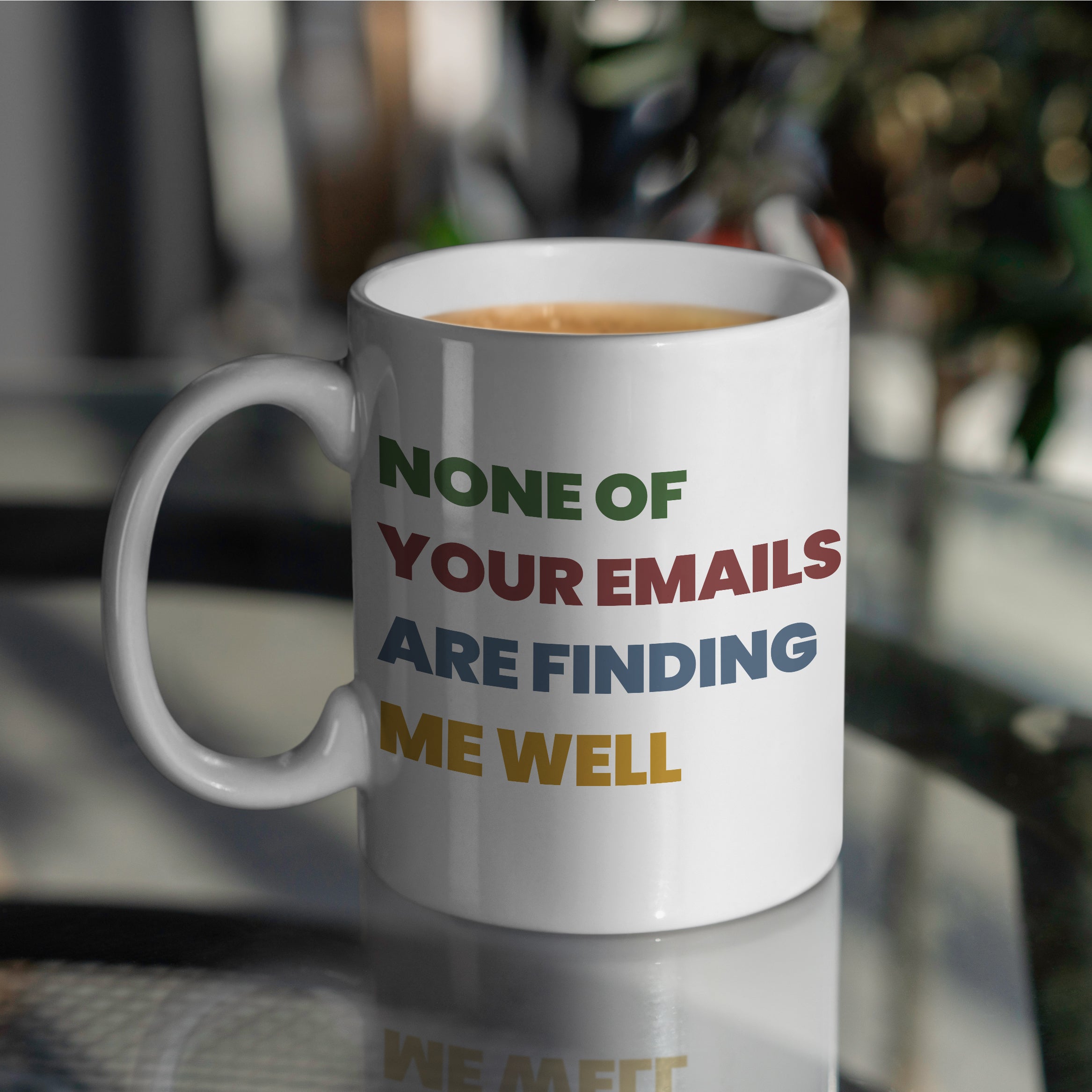 White ceramic mug on table with colorful text none of your emails are finding me well perfect office gift